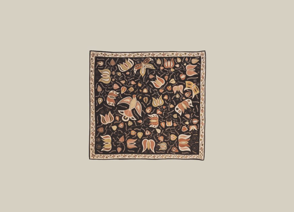 Flowers, caterpillars, butterflies, and a bird are depicted on this scarf. The figures' colors range from brown to gold. The background is completely black.