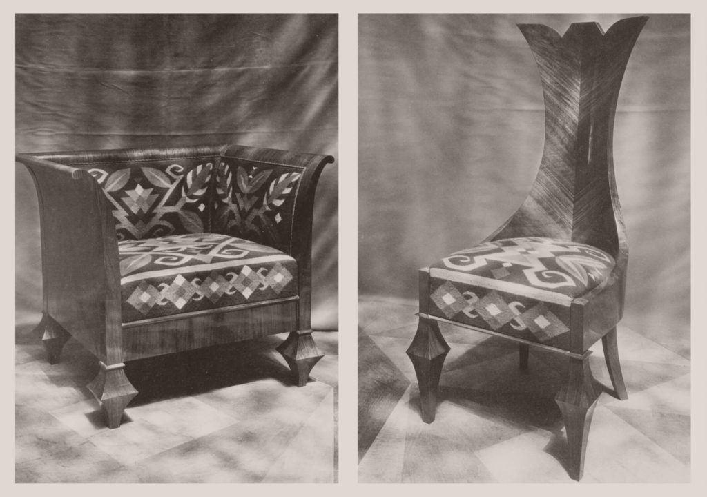 Two black and white photographs of artistically decorated chairs. The one on the left is deep and wide. Its armrests and backrest are one structure. The padding on the seat and backrest is decorated with simplified geometrical and plant-like patterns. The chair on the right has a similarly decorated seat, but it has no armrests. Its backrest is tall and slim with no padding.