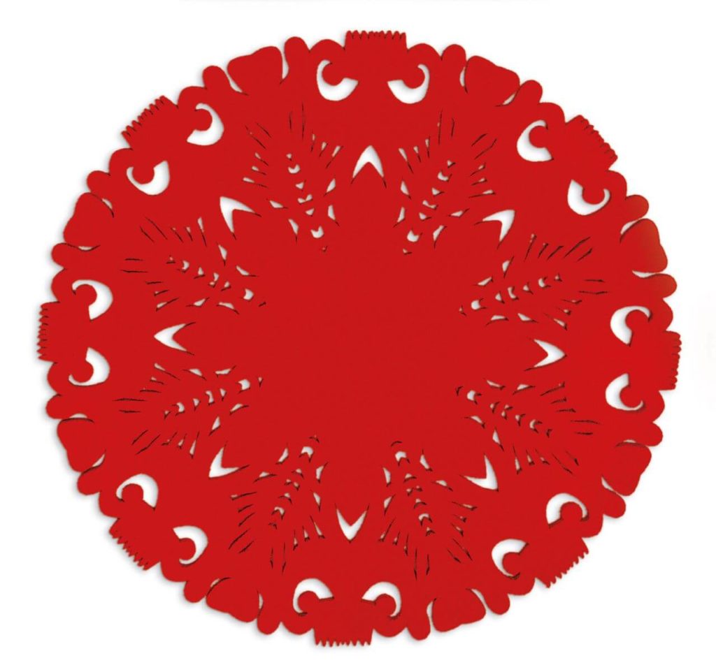 A red circular carpet decorated with folk, symmetrically placed patterns. From the top, it resembles a large, hand-made napkin.